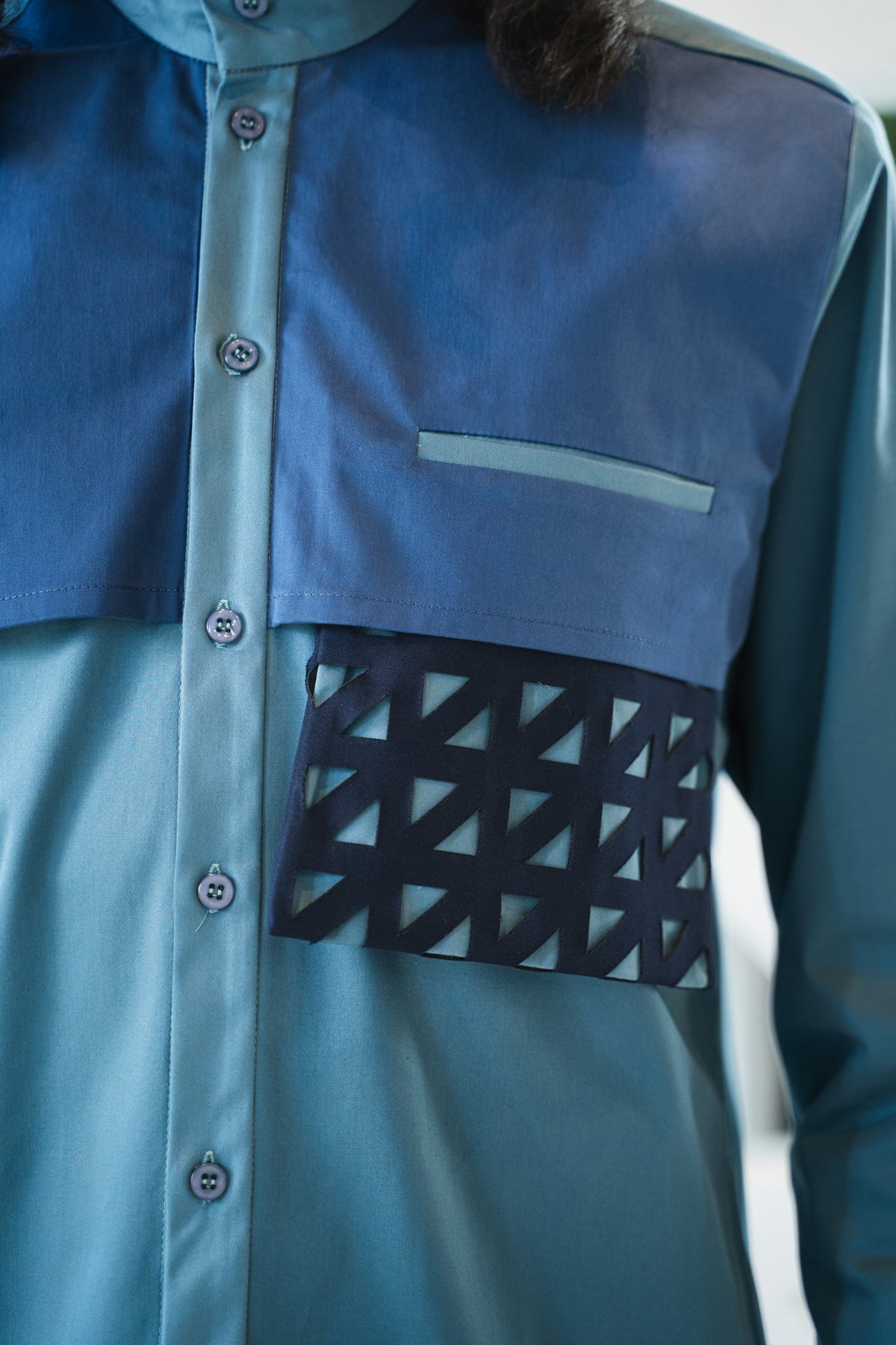 Architectural shirt with kirigami pockets